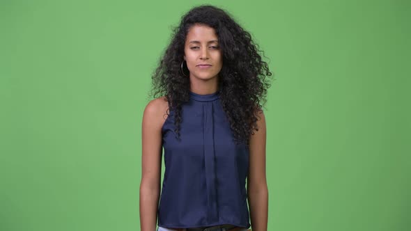 Young Beautiful Hispanic Businesswoman with Curly Hair