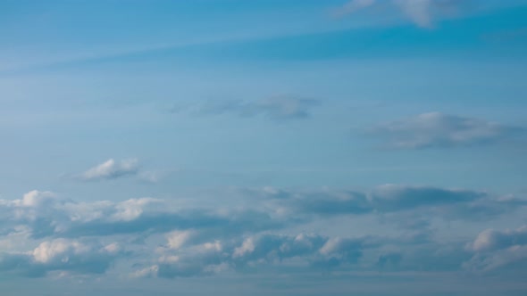 Fluffy White Clouds Moving Fast in Timelapse