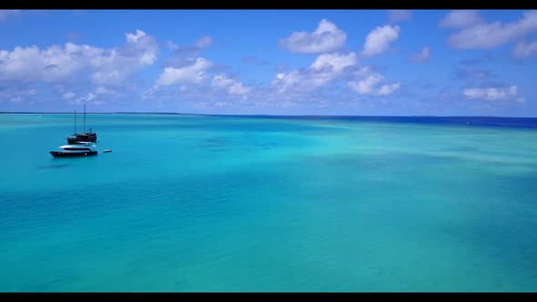 Aerial above texture of beautiful seashore beach lifestyle by blue water and white sand background o