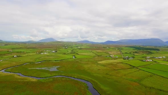 Aerial of green farmland