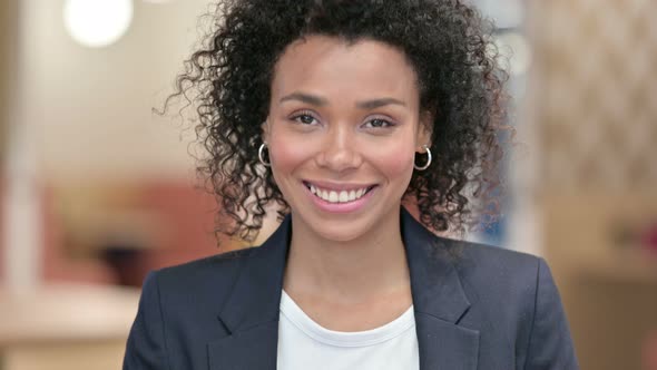 African Businesswoman Saying Yes By Shaking Head