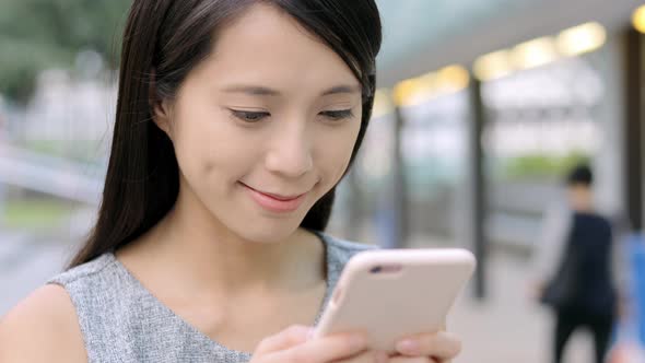 Young Woman use of mobile phone