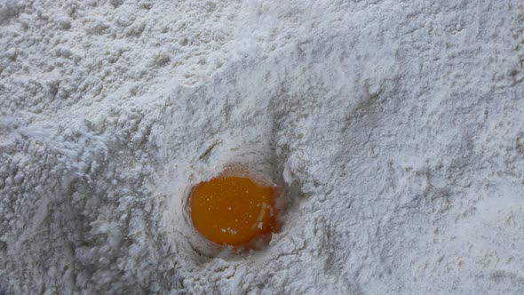 Yolk Falls Into Flour 12