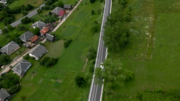 Aerial View of Bus Moving By Mountain Road