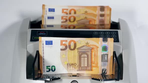 Modern Counter Works with New Euro Banknotes, Checking Them.