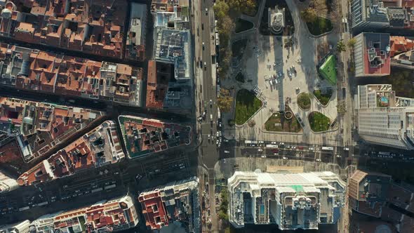 Aerial Birds Eye Overhead Top Down View of Traffic in Streets Around Plaza De Espana