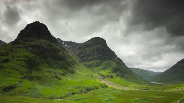 TIME LAPSE - The Three Sisters of Glen Coe, Scottish Highlands, wide zoom out