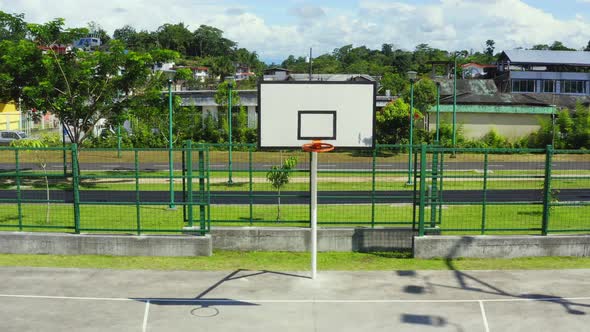 Front view, zooming out on a basketball hoop or goal 