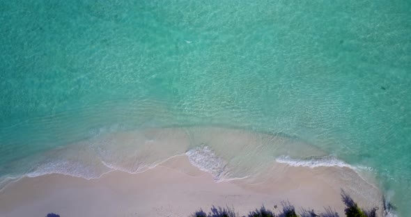 Tropical aerial clean view of a summer white paradise sand beach and aqua turquoise water background