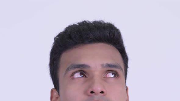 Eyes of Young Indian Man Thinking