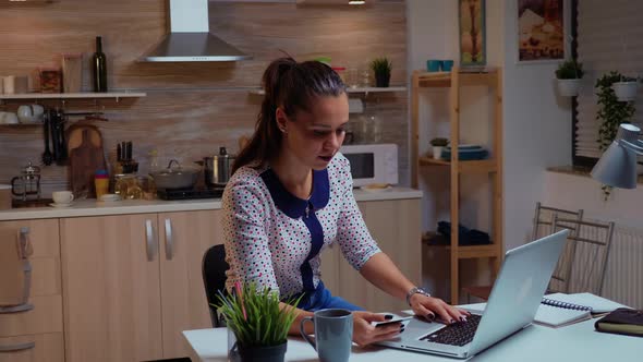 Woman Using Credit Card for Shopping Online