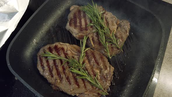 Cooking Beef on Grill Frying Pan