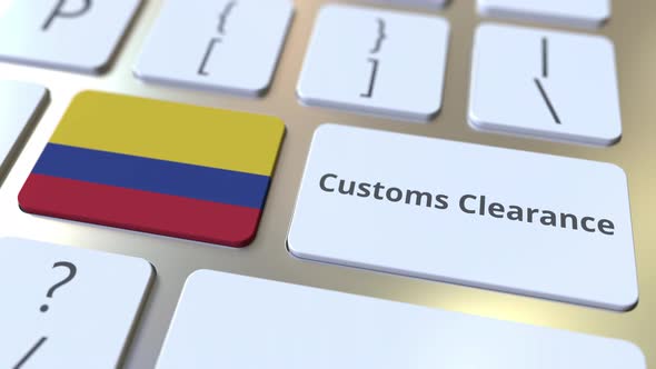 CUSTOMS CLEARANCE Text and Flag of Colombia on the Keyboard