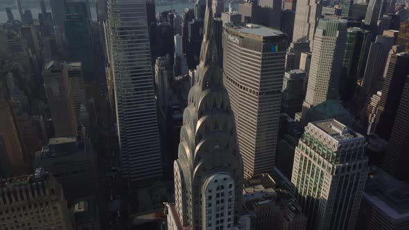 Aerial Descending Close Up View of Top of Chrysler Building with Distinctive Art Deco Crown and