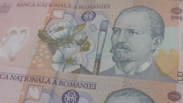 Slow tilt on lei paper money of Romania close-up 3840X2160p 30fps UltraHD video - Romanian national 