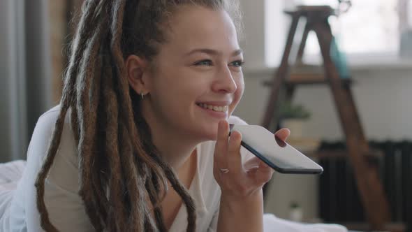 Joyful Woman Recording Voice Message