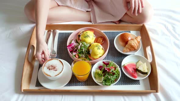 Breakfast in Bed Served with Cup of Coffee Salad Fresh Fruits and Egg Benedict