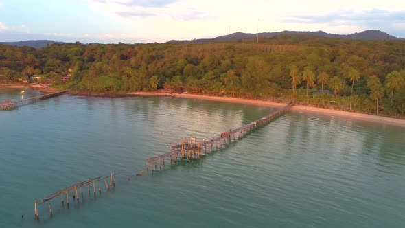 Flying at Sunset around Wooden peer