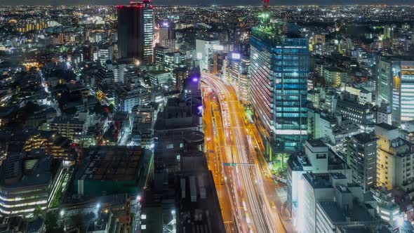 Time Lapse of busy highway and the buildings of Tokyo Japan at night