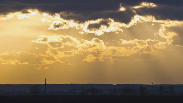 Time Lapse Footage of Fast Moving Evening Clouds on Yellow Sky at Sunset