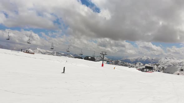 Side View Female Skier Skiing Slow In Gudauri Ski Resort