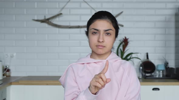 Portrait Of A Young Indian Woman Showing No No No And Looking At The Camera