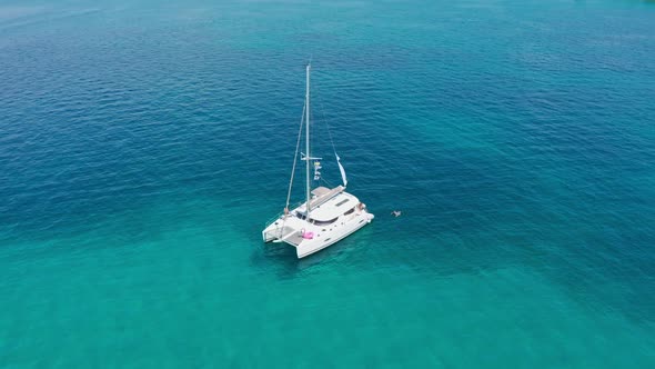 Drone Footage Aerial Top View of Catamaran Sailing in the Open Sea