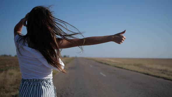 A Girl Is Catching a Car