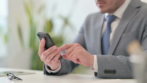 Close Up of Businessman Using Smartphone Mobile