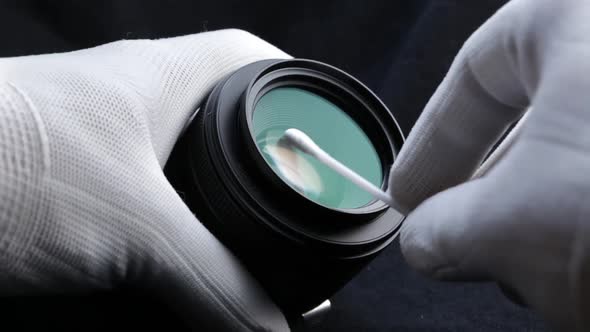 Cleaning Lens Surface Using A Cotton Swap