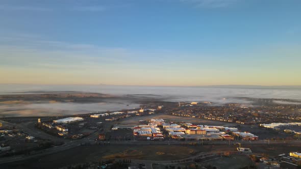 Golden hour over Central Valley in California. Fog emerging in the distance.