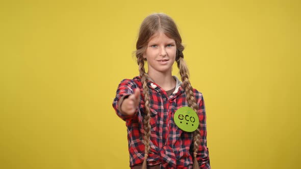 Friendly Teenage Girl Stretching Hand for Handshake Looking at Camera