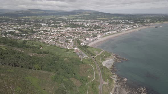 Top View Of The Beautiful Bray Head Mountain And Bray Town County In Wicklow, Ireland - aerial drone