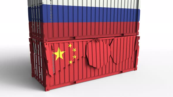 Container with Flag of Russia Breaks Container with Flag of China alt