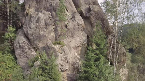 Aerial view stone rocks Ternoshorska Lada amidst beautiful scenic Carpathian mountains and forest