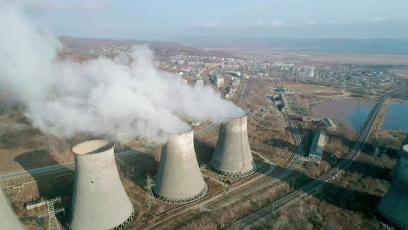 Aerial View of an Industrial Zone Pipes Pouring Thick White Smoke