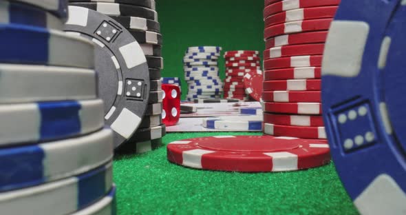 Green table for texas holdem. Poker with chips and cards.