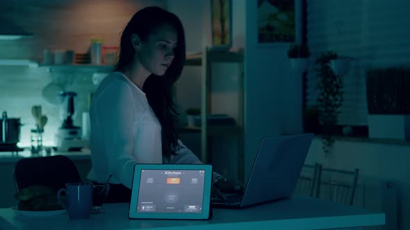 Remote Woman Working in Modern House Giving Voice Command to Tablet