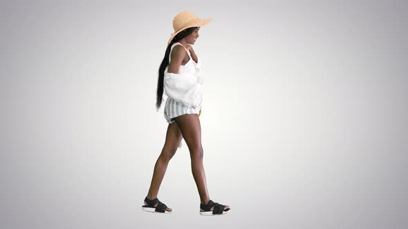 Summer in the City Beautiful African American Woman Walking on the Street, Wearing Fashionable Bag