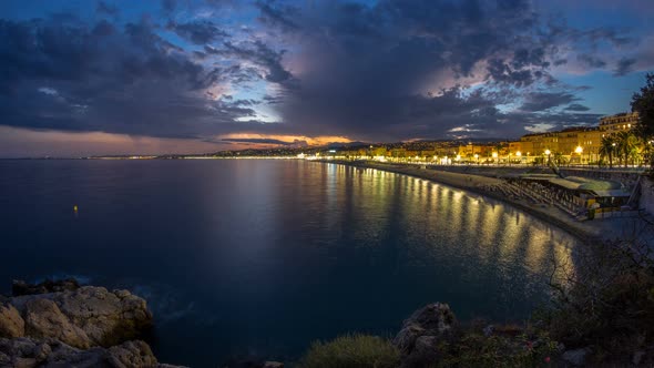 Waterfront of Nice City and Mediterranean Sea Day to Night Timelapse