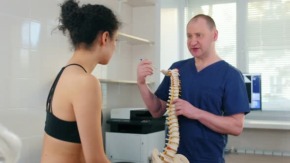 Doctor Inspecting the Young Woman Before the Session