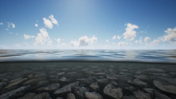 Ocean Seascape with Sky and Ocean Wave Splitted By Waterline to Underwater Part