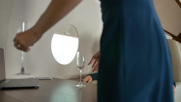Air Hostes Bringing Elite Expensive Champagne in Private Jet Cabin