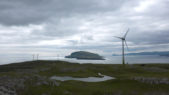 Environment friendly concept. Electrical windmill or wind turbine with rotating blades. Denmark.