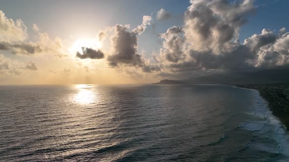 Storm at sea at sunset aerial view 4 K