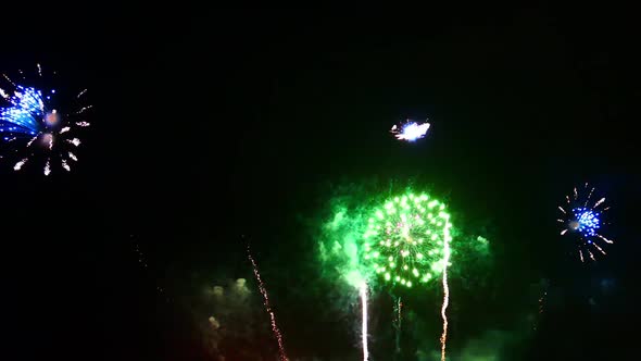 Colorful Firework display at night on sky background