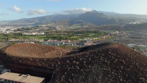 Drone shot of Montana Chayofita hill, Playa de Las Americas, Tenerife, Spain