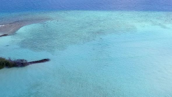 Drone aerial abstract of marine resort beach voyage by blue water with sand background