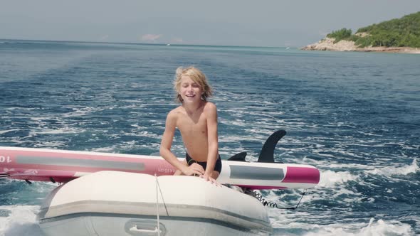 Kid Having Fun in Boat