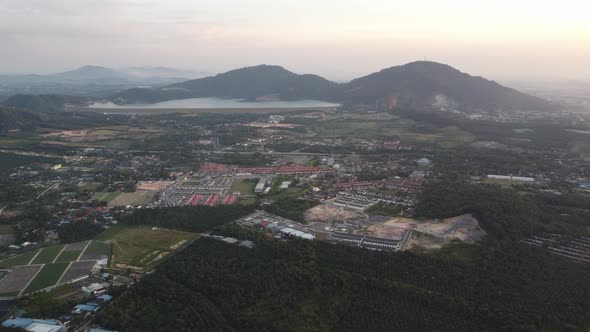 Aerial scenery of housing area near plantation